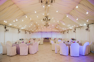 banquet table in a restaurant with flower decor