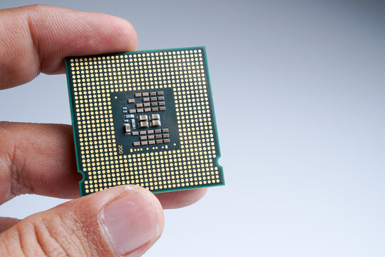 Close-up of modern CPU Chip Processor for tech science background. Selective Focus.

