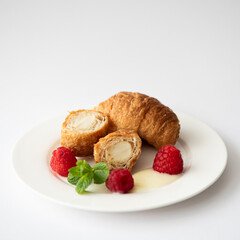 croissants with creamy and raspberries