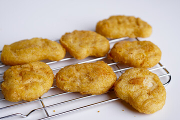 Chicken nuggets composition on white background. Copy space for text.
