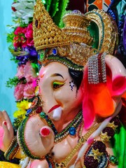 A colourful lord Ganesha statue with eco friendly decoration