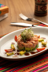 salmon fish avocado and tomatoes steak tartar - peru