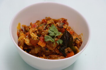 Baigan Bharta or Vangyache Bharit, a roasted and mashed eggplant fry or curry, favourite maharashtrian curry, served in a bowl, Indian traditional food