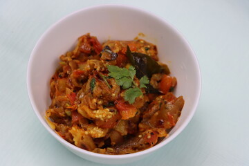 Baigan Bharta or Vangyache Bharit, a roasted and mashed eggplant fry or curry, favourite maharashtrian curry, served in a bowl, Indian traditional food