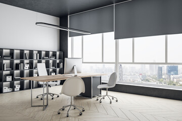 Modern office interior with panoramic city view.