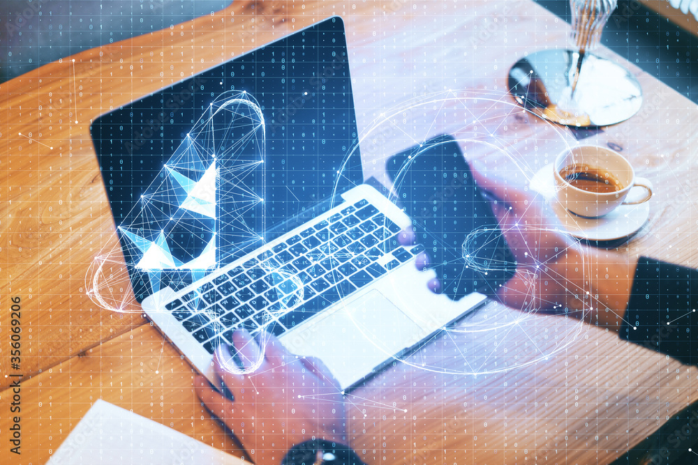 Aufkleber hands using smartphone on desktop with abstract 4g network hologram