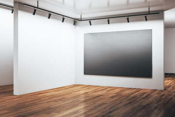 Luxury gallery hall with empty black poster on wall.