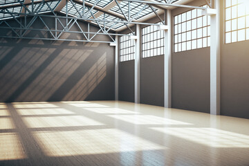 Modern storehouse interior with window and gray wall.