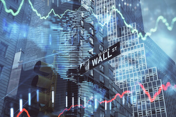 Forex chart on cityscape with tall buildings background multi exposure. Financial research concept.