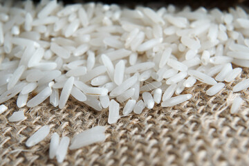 Macro shot of rice grain on brown background
