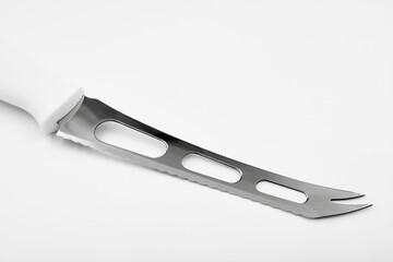 Cheese knife on white background