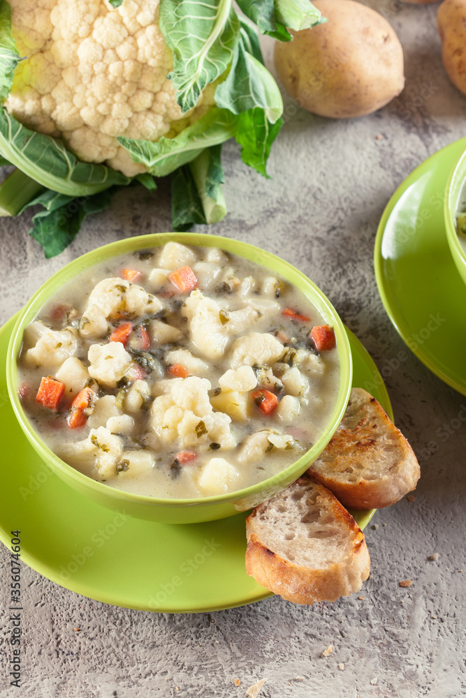 Wall mural vegetable soup with ingredients cauliflower