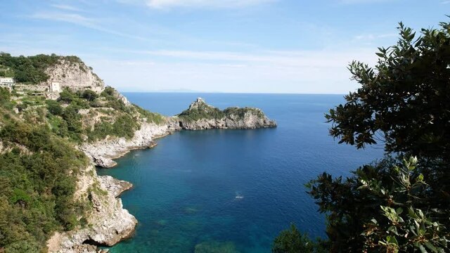 Promontory and tower of Capo di Conca in the municipality of Conca dei Marini. Coastal tower on the mediterranean sea. Amalfi Coast, Salerno, Campania, Italy