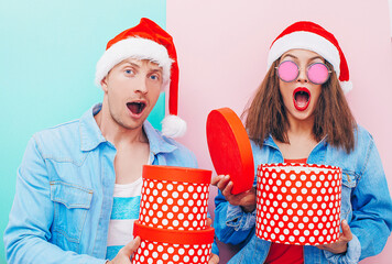 happy couple with christmas presents. Christmas couple. Man and woman gifts. Happiness. Life....