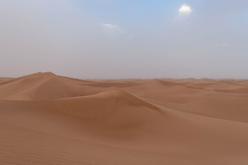 Sahara's dunes with blue sky
