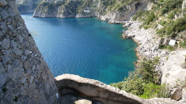 The tower of Capo di Conca in the municipality of Conca dei Marini. Coastal tower on the mediterranean sea. Amalfi Coast, Salerno, Campania, Italy