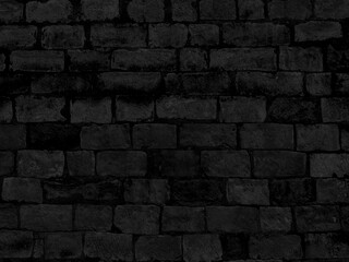 Black brick wall. Architectural dark texture. Abstract black background.