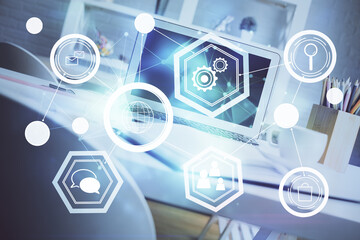 Computer on desktop with social network hologram. Double exposure. Concept of international people connections.