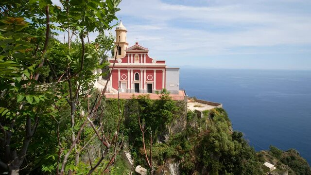 Apostolic Church of San Giovanni Battista (Baptist) overlooking the sea of the Amalfi coast. Conca dei Marini, Salerno, Campania, Italy