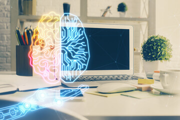 Double exposure of work space with computer and human brain drawing hologram. Brainstorm concept.