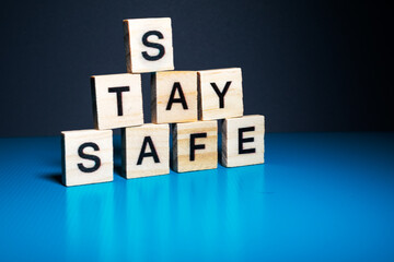 the word corona and stay safe arranged nicely on a colorful background with space for texts