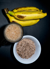 tea and flattened rice and mysore banana on a table for evening tea break