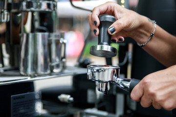 Barista is making coffee