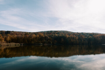 Fototapeta na wymiar Landscape background, sky, reflection in the morning lake. Tourism, journey, discover the world