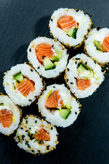 Uramaki on dark surface