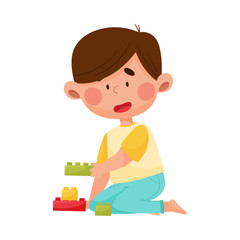 Cheerful Boy Character Sitting on the Floor and Playing with Blocks Vector Illustration