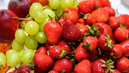 Obraz na płótnie Canvas Summer fruit platter. Peach, strawberries, grapes