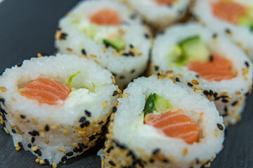 Uramaki on dark surface