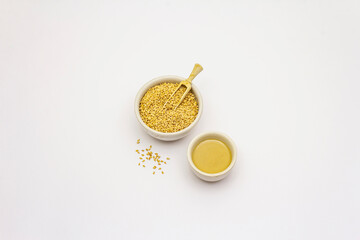 Tahini with sesame seeds isolated on white background