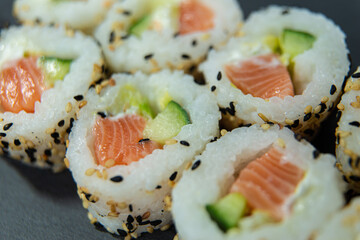 Uramaki on dark surface
