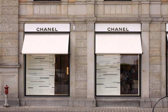 Chanel brand logo in front of Chanel boutique store. Copenhagen, Denmark - June 26, 2018