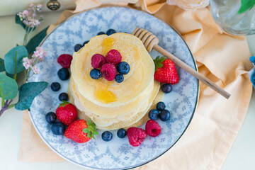 
Sweet pancakes with strawberries and blueberries

