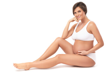 Fototapeta premium Pregnant woman on white background
