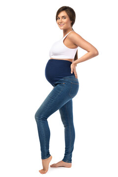 Young pregnant woman wearing maternity jeans