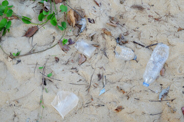 Plastic bottles on the beach, garbage on the beach