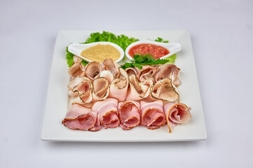 meat plate with green leaf mustard and horseradish on a white background  - Powered by Adobe