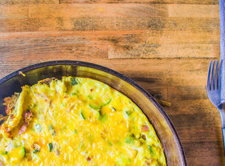 Omelet with eggs, zucchini and cheese