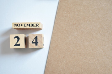 November 24, Empty white - brown background.