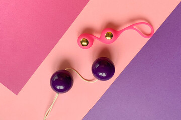 Sex toys. Geisha balls on a pink background. Useful for sex shop, adults