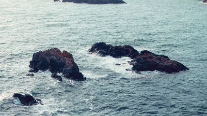 Waves Crashing on to Rocks