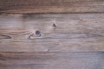 Fototapeta premium In selective focus rough skin surface of an old wooden plank for background texture 