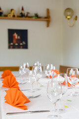 charming and warm table and place settings interior shot of a restaurant table