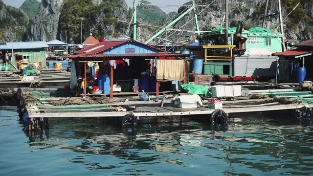 Floating Fishing Village In The Ha Long Bay. Cat Ba Island, Vietnam. 4K