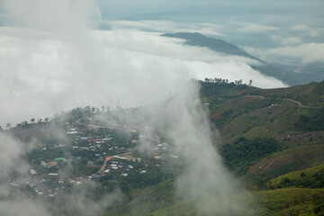 Fog, city, uphill
