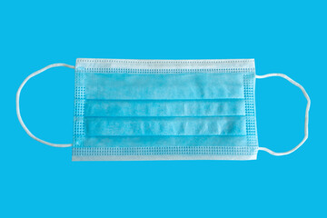 Medical mask  on a blue background .