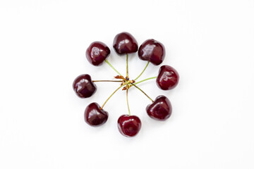 red cherry on a white background, round, isolated